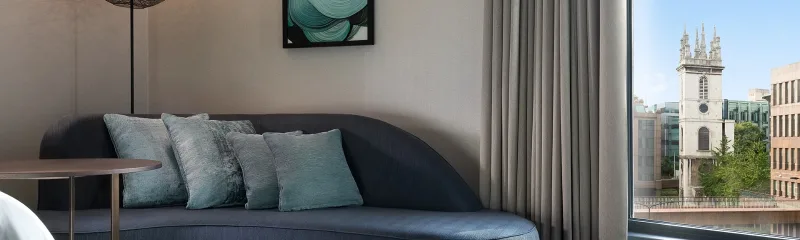 Living room image with sofa and blinds